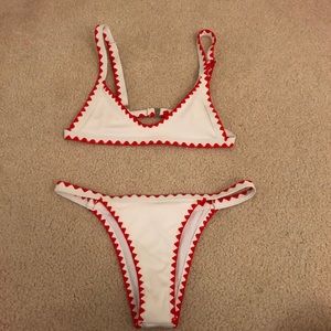 white and red bikini swimsuit top and bottom